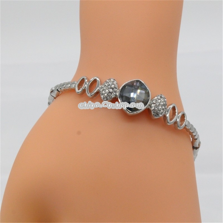 Silver Plated Zircon Inset Egg Shaped Blue Crystal Ripple Buckle Bracelet